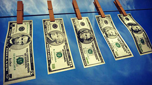 Ilustrasi pencucian uang. (morganmckinley.com.hk)