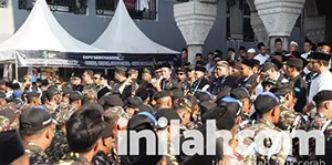 Pasukan keamanan Muktamar ke-35 NU saat menggelar apel keamanan di Jombang, Jawa Timur, Minggu (30/8/2026).(Foto:Inilah.com).